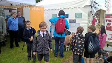 Royal Highland Show 2015 - Inksters - Crofting Law - Children queue for Inky the Sheep